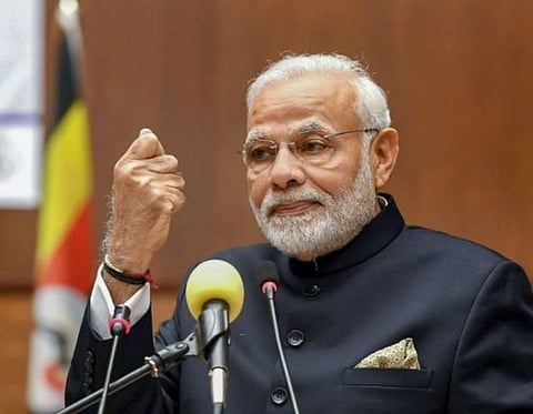 Not afraid of being seen with any industrialist, says PM Narendra Modi