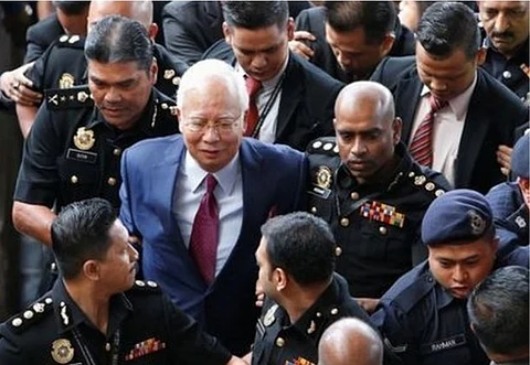 Ex-Malaysian PM charged with abuse of power