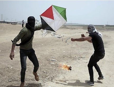 Hamas to halt flaming kite attacks on Israel