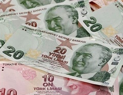 Turkish lira depreciates after credit rating downgrade