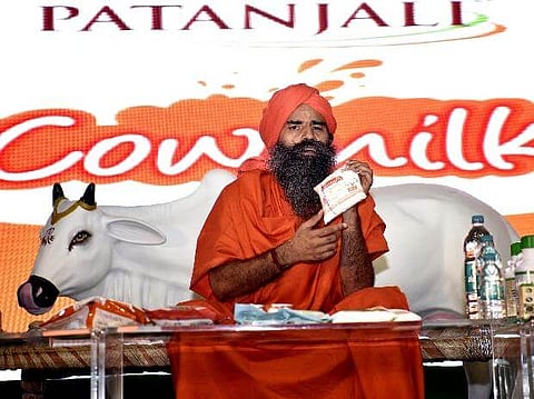 Baba Ramdev’s Patanjali will compete Amul; launches cow milk, milk products, also French fries