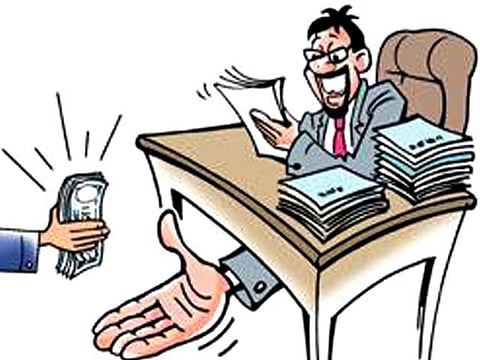 Lat Mandal of Kaliabor circle caught red handed while taking bribe