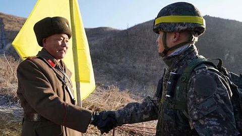 Korean Soldiers Cross Demilitarised Zone for the First Time