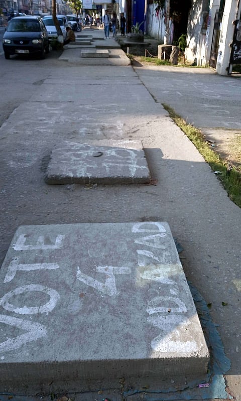 Hastily Covered Manholes Brewing Trouble In City