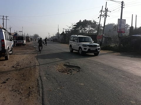 Potholes in NH-37 road in Demow