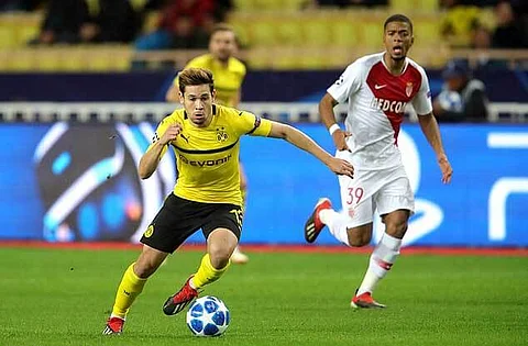 Borussia Dortmund beat Monaco to take top spot