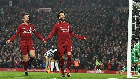 Liverpool pound Newcastle to strengthen grip on 1st place