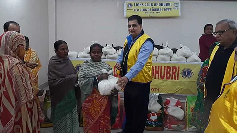 Rice distributed to poor by Lions club of Dhubri