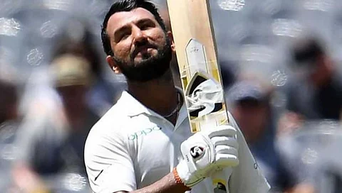 Gujarat wins thriller, Cheteshwar Pujara stars again