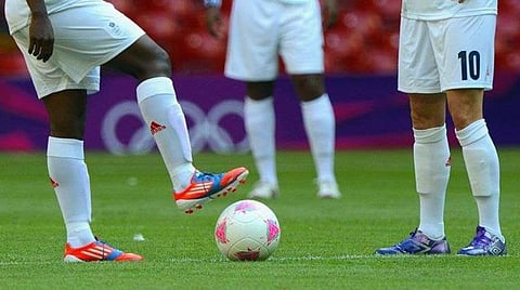 Iran to drop tattooed footballers from team