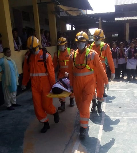 National Disaster Response force (NDRF) conducts mock drill on earthquake in Barpeta school
