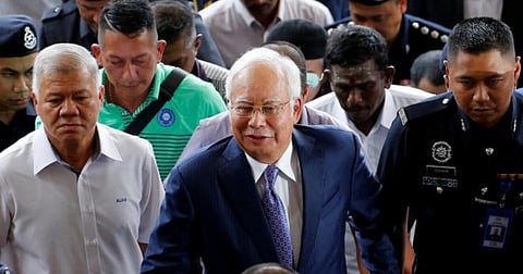 Malaysian Ex-PM Najib Razak Stands Trial In 1MDB Scandal