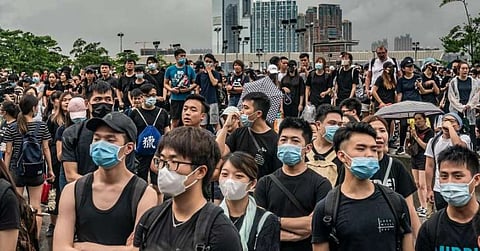 China backs embattled chief of Hong Kong