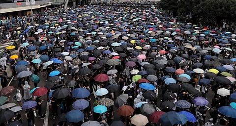 Massive protests in Hong Kong delay extradition bill debate