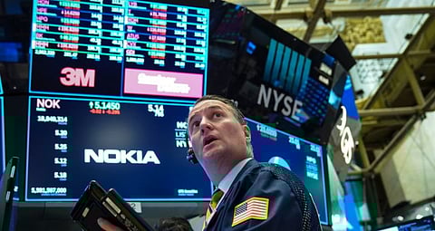 US stocks close higher amid trade hopes, Federal meeting