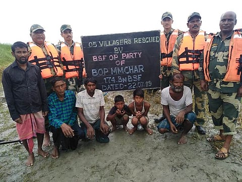 Flood affected people rescued by BSF Jawans near Assam-Bengal Border