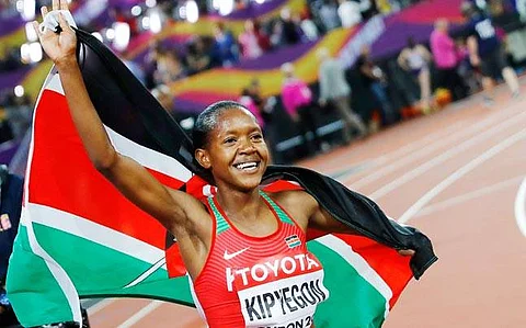 Olympic Champion Faith Kipyegon Eyes World Title in Doha