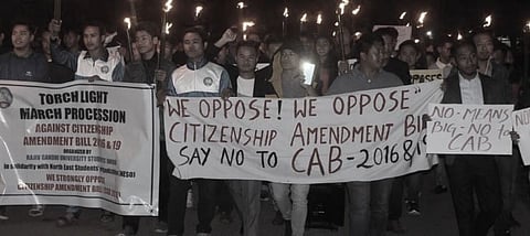 Rajiv Gandhi University students bring out torchlight rally against CAB