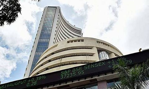 Sensex, Nifty end flat; TCS, SBI top losers