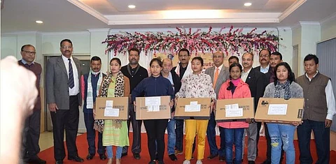 Daughters of Assam martyrs receive laptops donated by Atharva Foundation of Mumbai