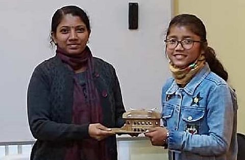 Sivasagar DC Dr MS Lakshmi Priya felicitates Dhriti Phukan