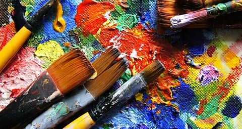 Brushes and colours keep artist Rabiram Brahma busy at Udalguri