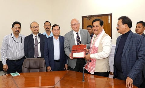 NRL MD SK Barua handing over dividend cheque to CM Sarbananda Sonowal in Guwahati