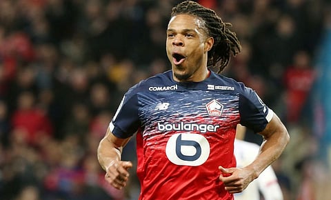 Soccer: Lille sink Lyon to maintain Champions League hopes