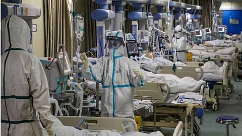 China COVID-19 cases fall below 100; world total over 100,000