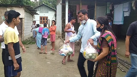 Laudable effort to Mukunda Talukdar and family members to help the needy families