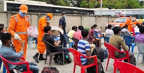 NDRF distributes food packets, masks to more than 650 needy passengers in Guwahati