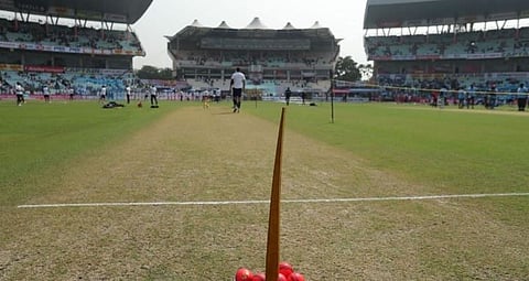 Coronavirus: Eden groundsmen maintain social distancing while working on a pitch