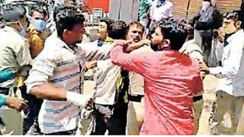 police beaten fruit sellers