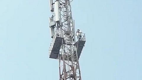 climbed the mobile tower for the damaged road