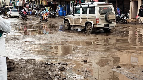 Mud and potholes on the road in Kalvan