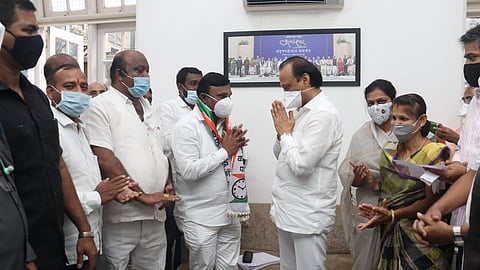 bjp leader mayor namdev raut joins ncp with four councilors and workers in karjat