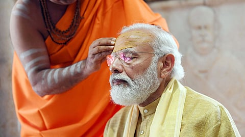 धर्माचं राजकारण यूपीसाठी अफूची गोळी; PM मोदींवर शिवसेनेची टीका