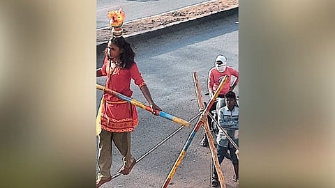 Small Child doing hard work for food nanded