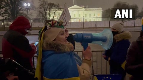 Demonstrators protest outside the White House