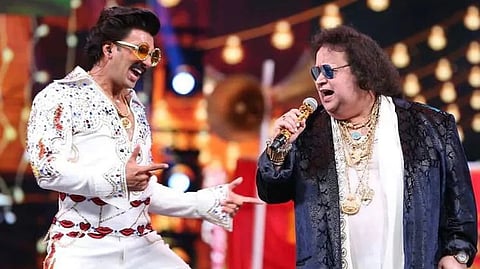 Bappi Lahiri and Ranveer Singh during a concert.