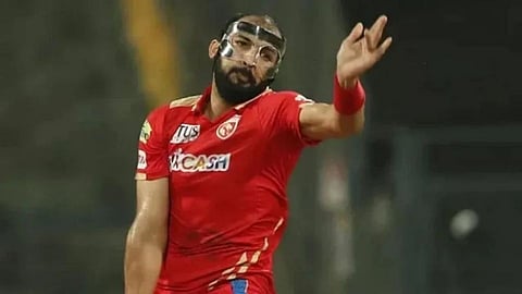 Rishi Dhawan Wears Unique Face Mask Bowling