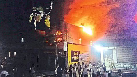 two floored house set on fire in satana Millions of rupees worth goods burnt Nashik News