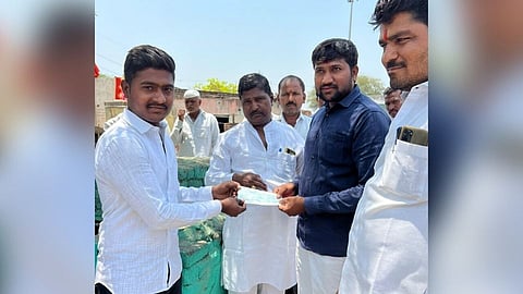 solapur village son donate One lakh for development