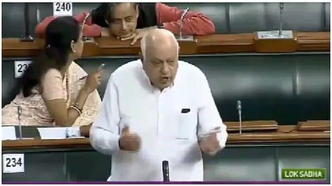 Shashi Tharoor chats with Supriya Sule as Farooq Abdullah gives a speech. Memes explode on Twitter