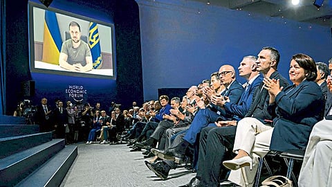 Russia invading Ukraine Volodymyr Zelenskyy World Economic Forum restriction on russia