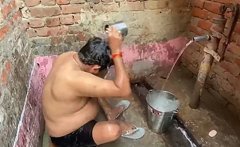 Minister bathes on supporters house