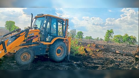 Akola farmer farm road by Administration officials with JCB