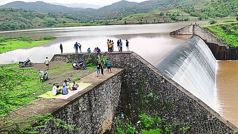 Tourists risking their lives to take selfies.