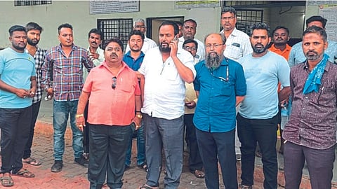 Angry karting agents, traders near the booking office at the train station.