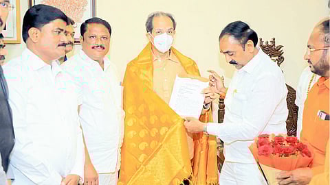 Matoshreet Shiv Sena chief Uddhav Thackeray giving a letter about the organization, former mayor Bhagwan Karankal.